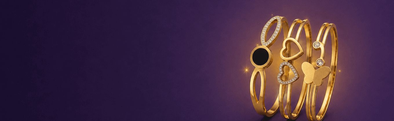 Cuff Stack Trio - three gold cuffs with onyx disc, pave hearts and a butterfly motif