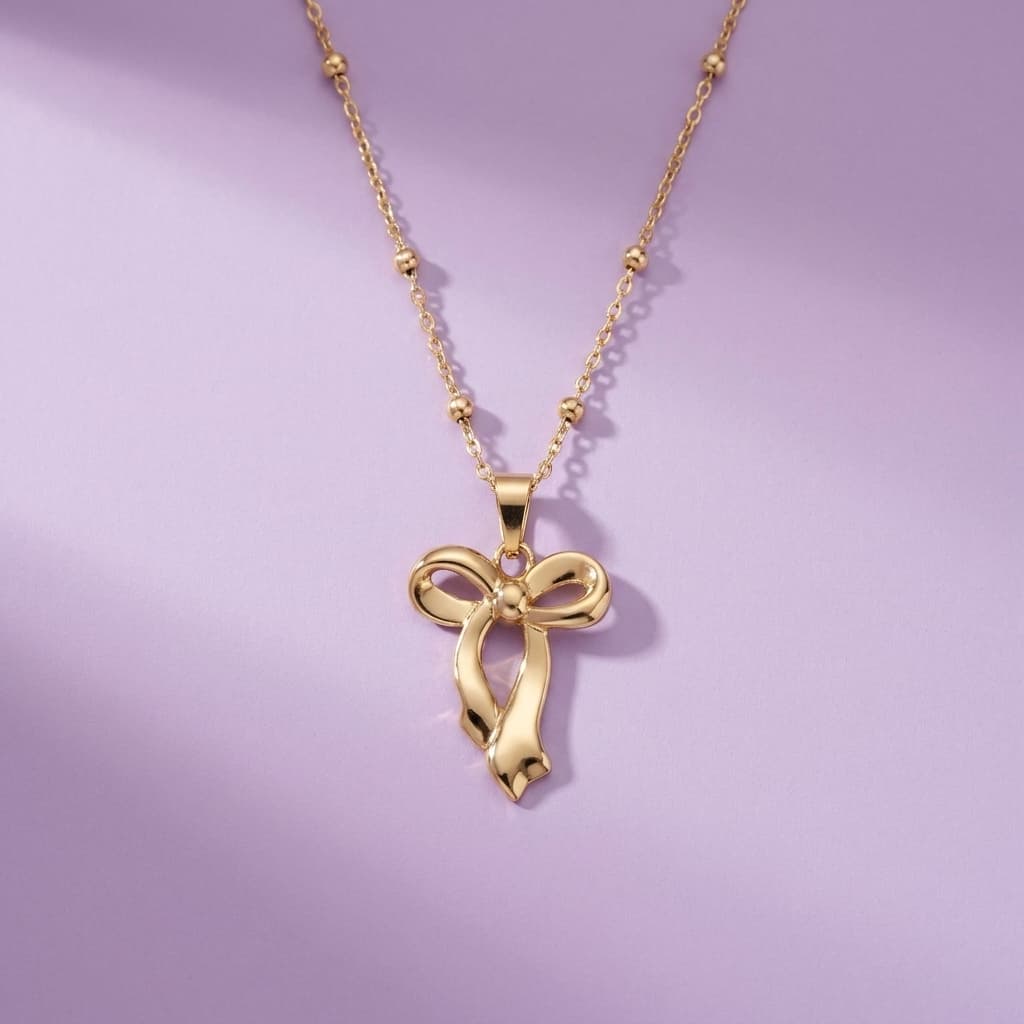 Gold-Toned Ribbon Bow Satellite Chain