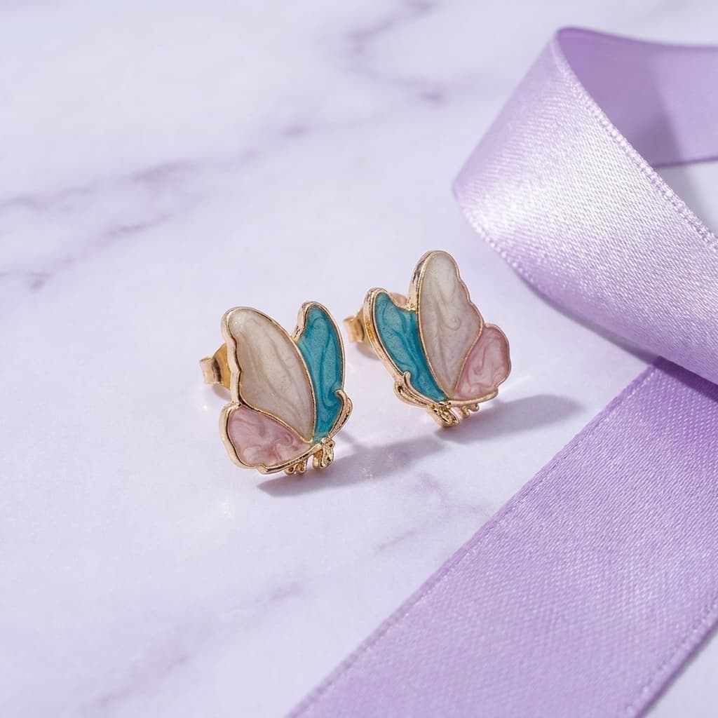 Enamel Butterfly Studs In Teal And Cream