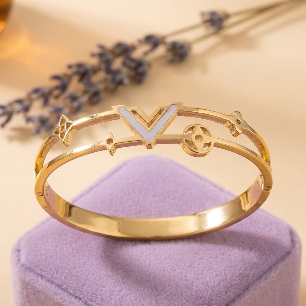 Two-Tone Cut-Out Motif Hinged Bangle